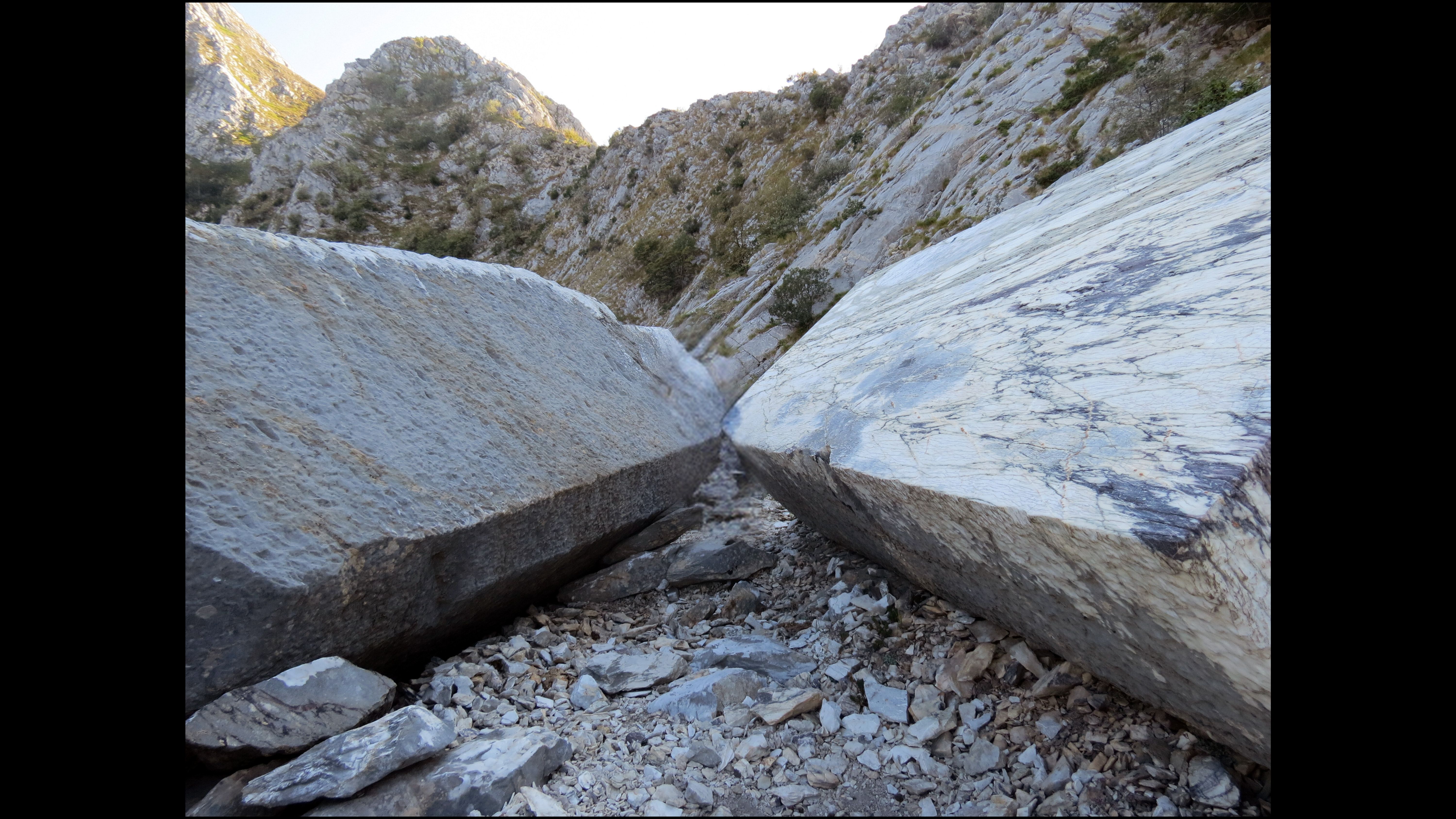 Large marble blocks in a mountain setting in the Apuan Alps
